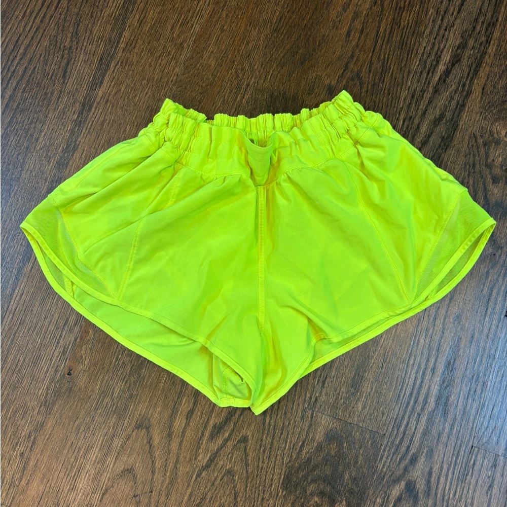 Lululemon neon yellow running shorts.
